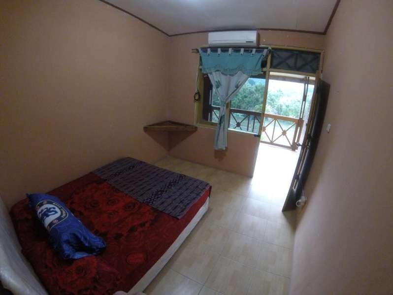 Supersuck Hotel Maluk Extérieur photo